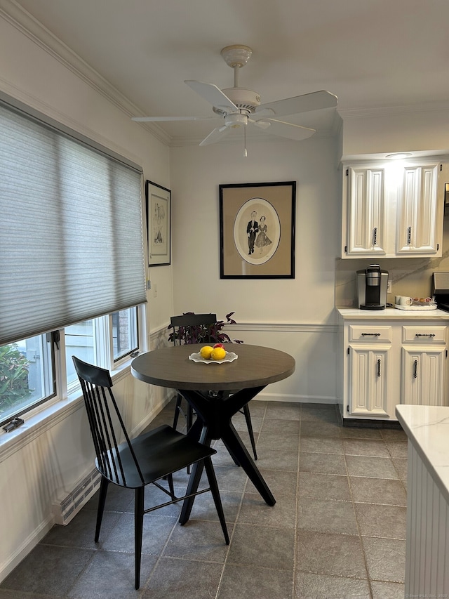 210 Jamestown Rd Unit 210, Stratford, CT 06614 - dining space featuring ornamental molding, a baseboard heating unit, light tile patterned flooring, and a ceiling fan