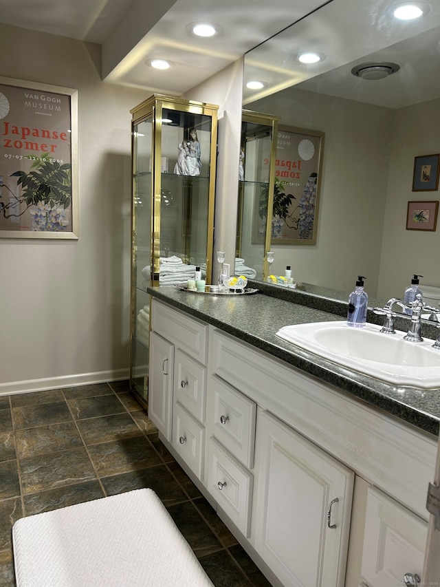 210 Jamestown Rd Unit 210, Stratford, CT 06614 - full bathroom featuring vanity, recessed lighting, and stone finish flooring