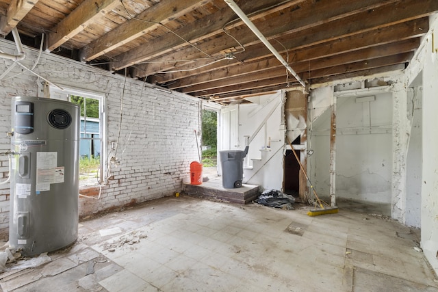 110 Franklin St, Killingly, CT 06239 - below grade area with electric water heater and stairs