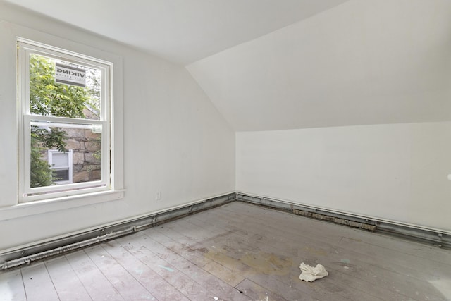 110 Franklin St, Killingly, CT 06239 - additional living space featuring hardwood / wood-style flooring and vaulted ceiling
