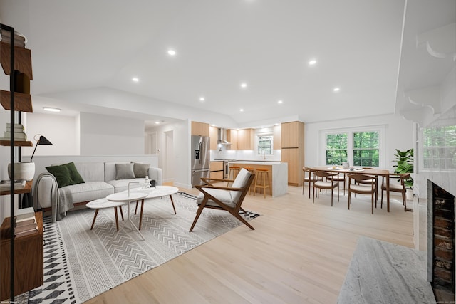 51 Brentley Dr, Shelton, CT 06484 - living area with lofted ceiling, light wood-style flooring, recessed lighting, and a fireplace