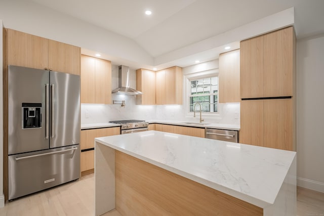 51 Brentley Dr, Shelton, CT 06484 - kitchen with appliances with stainless steel finishes, modern cabinets, wall chimney exhaust hood, light brown cabinets, and lofted ceiling