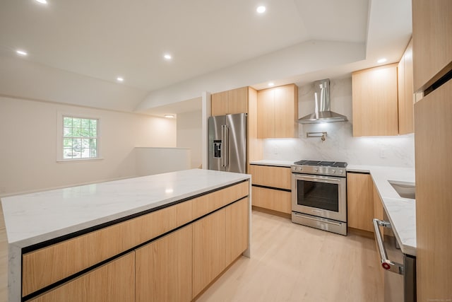 51 Brentley Dr, Shelton, CT 06484 - kitchen featuring wall chimney exhaust hood, stainless steel appliances, light brown cabinetry, modern cabinets, and light stone countertops