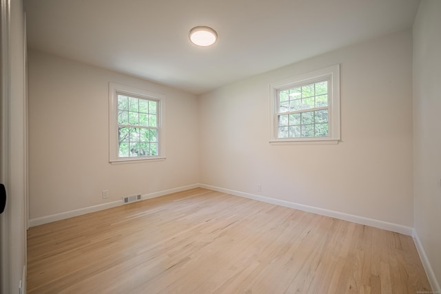 51 Brentley Dr, Shelton, CT 06484 - unfurnished room featuring plenty of natural light and light wood-style flooring