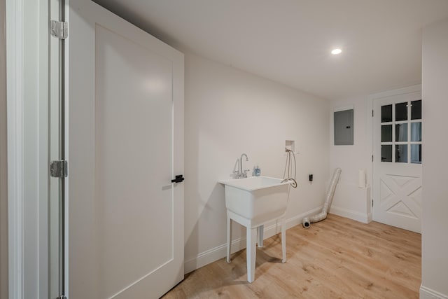 51 Brentley Dr, Shelton, CT 06484 - washroom featuring hookup for a washing machine, light wood finished floors, electric panel, and recessed lighting