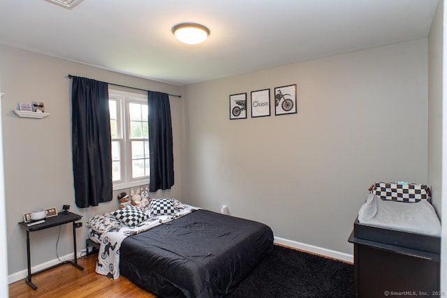 24 Dogwood Ln, Shelton, CT 06484 - bedroom with baseboards and wood finished floors