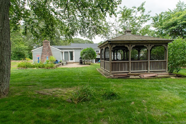 24 Dogwood Ln, Shelton, CT 06484 - rear view of property with a gazebo, a lawn, a patio, and a chimney