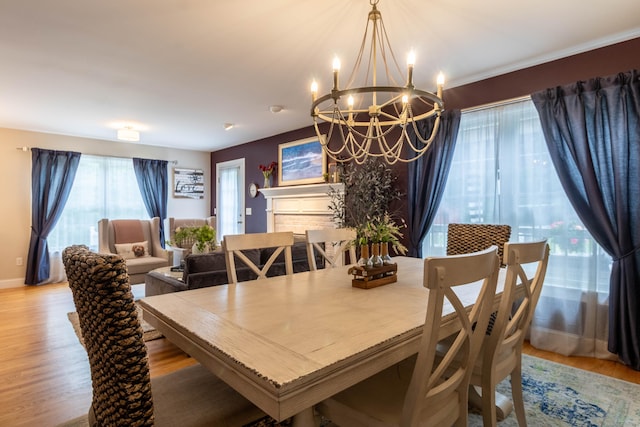 129 Clark Gates Rd, East Haddam, CT 06469 - dining room featuring a chandelier and light wood-type flooring