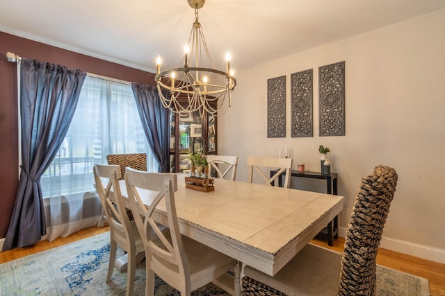129 Clark Gates Rd, East Haddam, CT 06469 - dining area with a chandelier and light wood-style flooring
