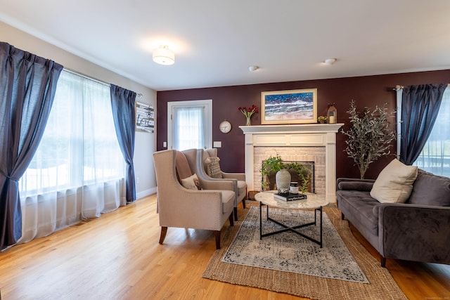 129 Clark Gates Rd, East Haddam, CT 06469 - living room featuring light wood finished floors and a fireplace