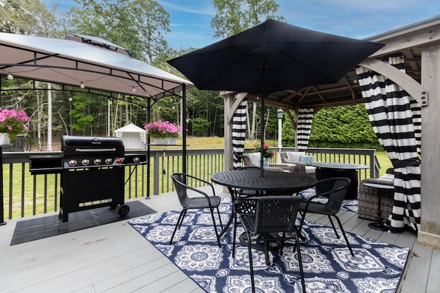 129 Clark Gates Rd, East Haddam, CT 06469 - deck with a gazebo, a grill, a yard, and outdoor dining space