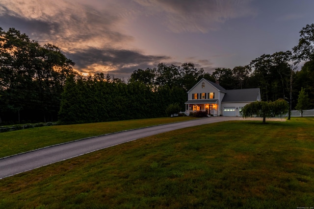 129 Clark Gates Rd, East Haddam, CT 06469 - view of front of property featuring driveway, a yard, a chimney, and a garage
