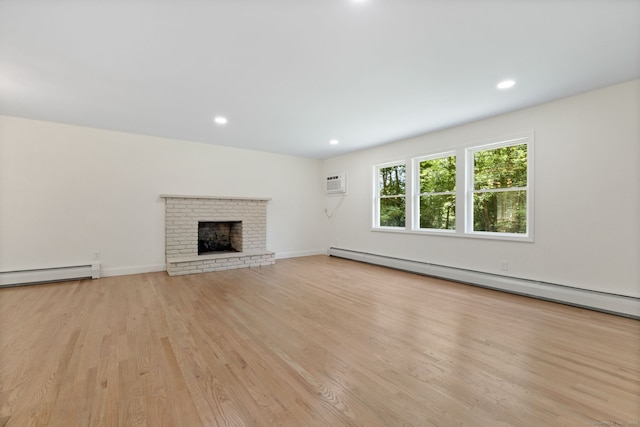95 Great Ring Rd, Newtown, CT 06482 - unfurnished living room featuring a baseboard heating unit, light wood finished floors, recessed lighting, and a fireplace