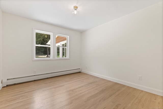 95 Great Ring Rd, Newtown, CT 06482 - empty room featuring a baseboard radiator and wood finished floors