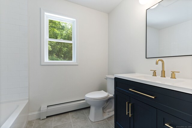 95 Great Ring Rd, Newtown, CT 06482 - full bathroom with baseboard heating, vanity, and tile patterned flooring