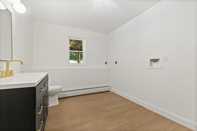 95 Great Ring Rd, Newtown, CT 06482 - bathroom with a baseboard radiator, vanity, and wood finished floors