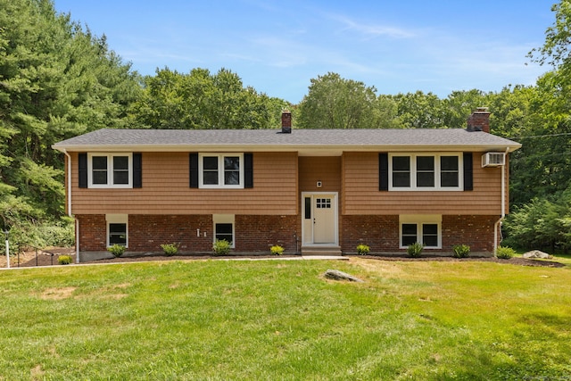 95 Great Ring Rd, Newtown, CT 06482 - raised ranch with a chimney, a front lawn, and a wall mounted air conditioner