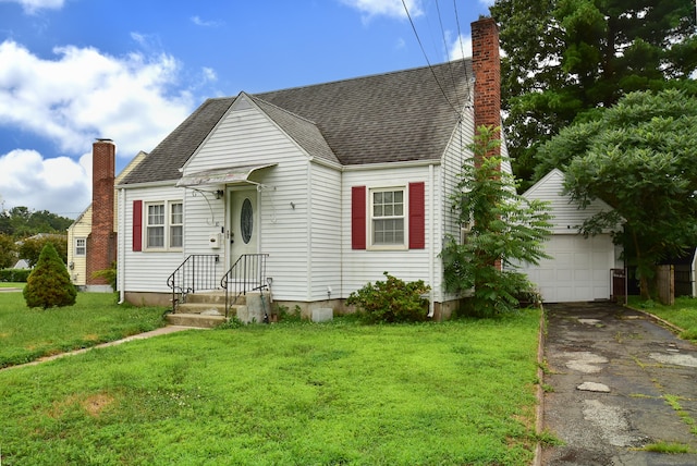 30 Foxcroft Dr, Manchester, CT 06040 - view of front of property with a chimney, a front lawn, asphalt driveway, and an outdoor structure