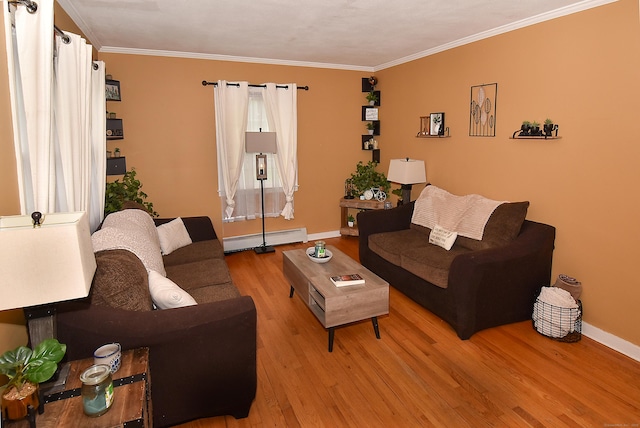 30 Foxcroft Dr, Manchester, CT 06040 - living room featuring baseboard heating, light wood-style floors, and crown molding