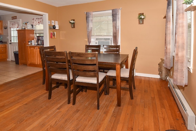 30 Foxcroft Dr, Manchester, CT 06040 - dining space with a baseboard radiator, light wood finished floors, and cooling unit