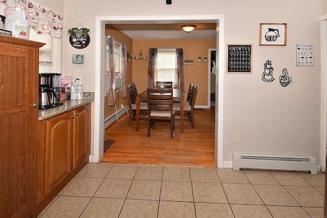 30 Foxcroft Dr, Manchester, CT 06040 - dining room with a baseboard radiator and light tile patterned floors