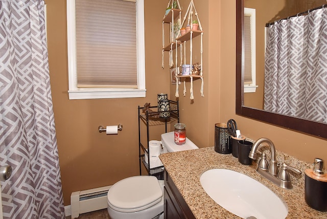 30 Foxcroft Dr, Manchester, CT 06040 - full bath featuring a baseboard radiator, vanity, and a shower with curtain
