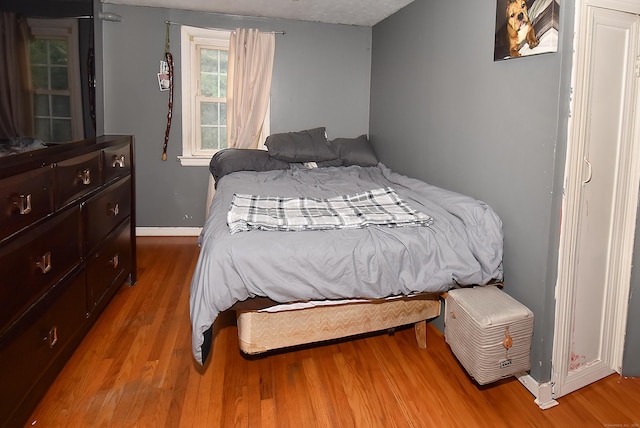 30 Foxcroft Dr, Manchester, CT 06040 - bedroom featuring wood finished floors and baseboards