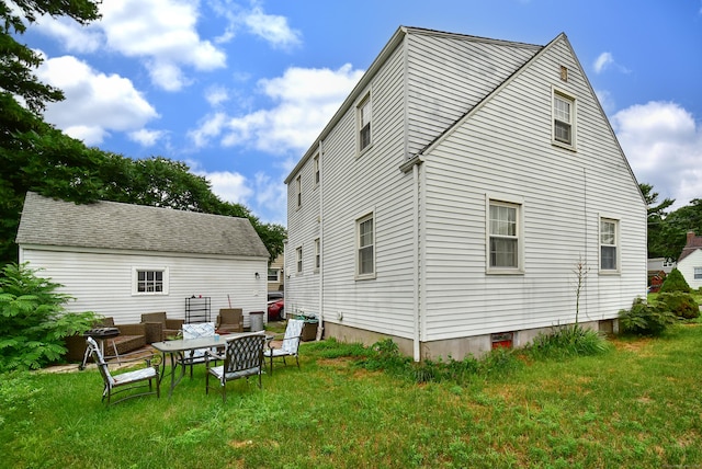 30 Foxcroft Dr, Manchester, CT 06040 - back of house with a lawn