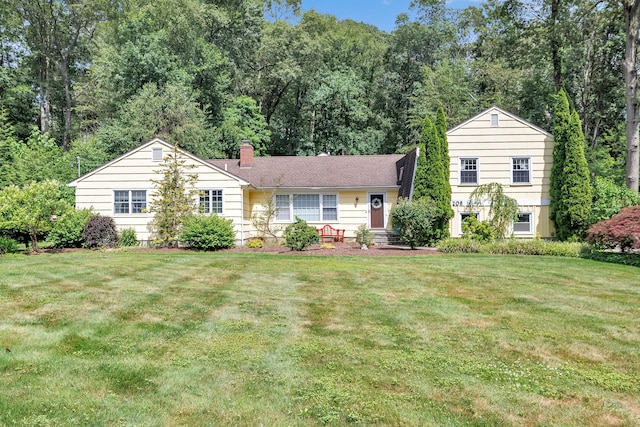 206 Beacon Hill Rd, Trumbull, CT 06611 - split level home with a chimney and a front lawn
