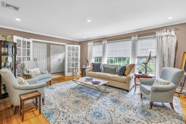 206 Beacon Hill Rd, Trumbull, CT 06611 - living area featuring crown molding, wood-type flooring, french doors, recessed lighting, and baseboard heating