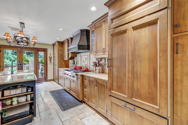 206 Beacon Hill Rd, Trumbull, CT 06611 - kitchen featuring custom range hood, decorative backsplash, a chandelier, recessed lighting, and light stone counters