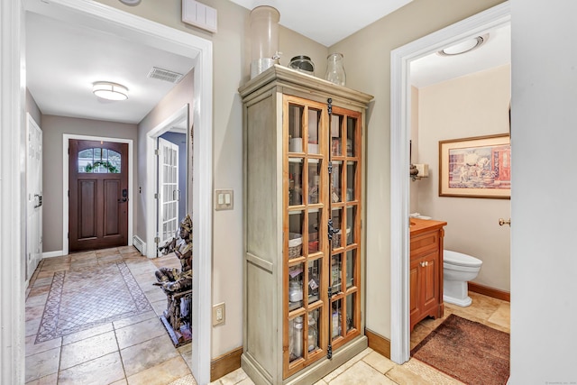 206 Beacon Hill Rd, Trumbull, CT 06611 - entrance foyer featuring baseboards and light tile patterned floors