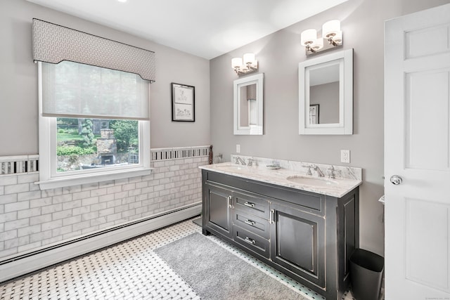 206 Beacon Hill Rd, Trumbull, CT 06611 - full bath featuring baseboard heating, double vanity, and a chandelier