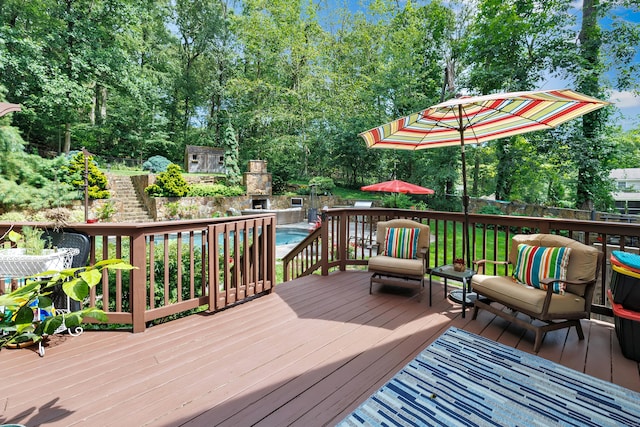 206 Beacon Hill Rd, Trumbull, CT 06611 - wooden deck featuring an outdoor fireplace and view of wooded area