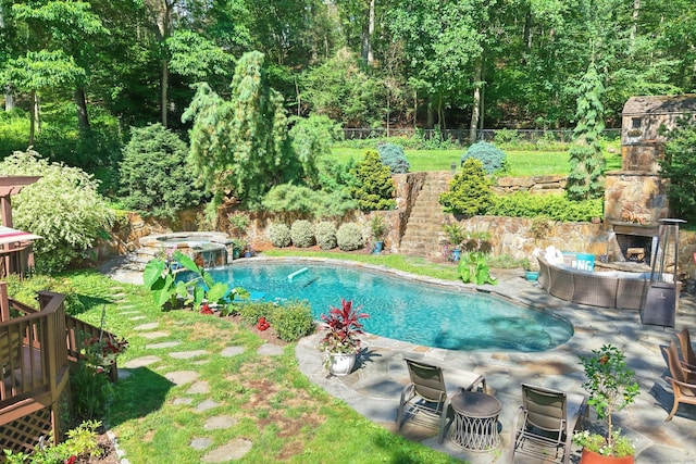 206 Beacon Hill Rd, Trumbull, CT 06611 - view of swimming pool featuring a patio area, an in-ground hot tub, and an outdoor living space with a fireplace