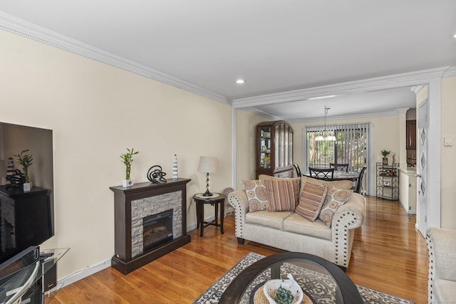 60 Alvord Ln Apt 19, Stamford, CT 06902 - living room with ornamental molding, light wood-style flooring, recessed lighting, and a fireplace