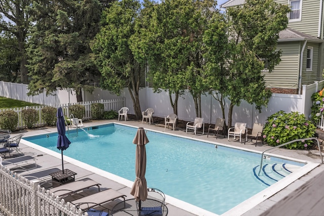 60 Alvord Ln Apt 19, Stamford, CT 06902 - view of swimming pool featuring a fenced backyard and a patio area