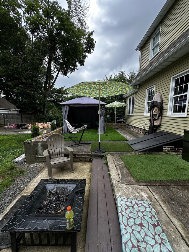 54 Carmel St, Hamden, CT 06518 - view of yard with an outdoor fire pit and a gazebo