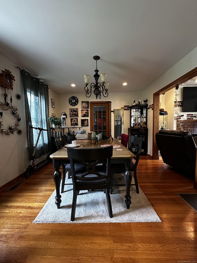 54 Carmel St, Hamden, CT 06518 - dining room featuring a chandelier, wood finished floors, and recessed lighting