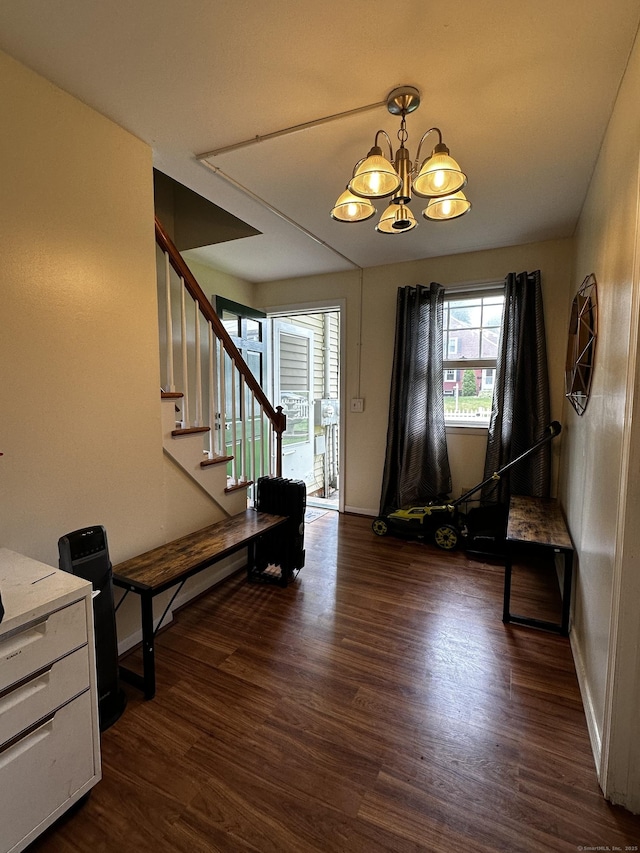 54 Carmel St, Hamden, CT 06518 - foyer entrance with dark wood-style floors, a chandelier, and stairs