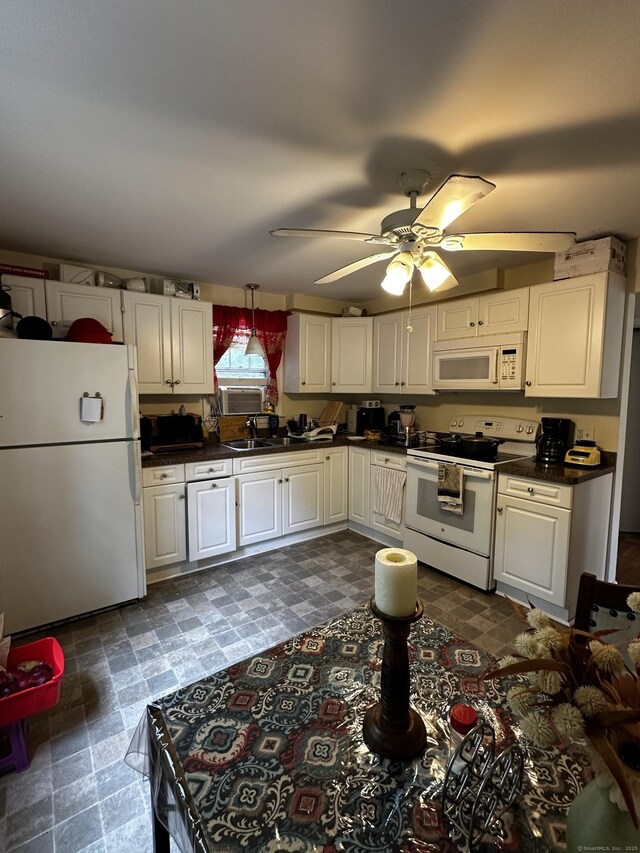 54 Carmel St, Hamden, CT 06518 - kitchen featuring white appliances, dark countertops, ceiling fan, and white cabinets