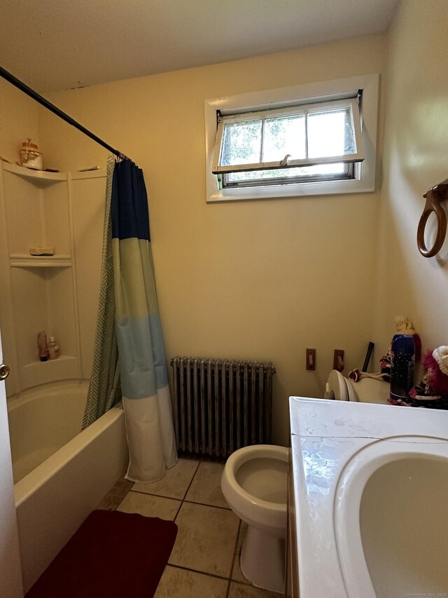 54 Carmel St, Hamden, CT 06518 - bathroom with radiator heating unit, tile patterned flooring, shower / bath combo, and washer / clothes dryer