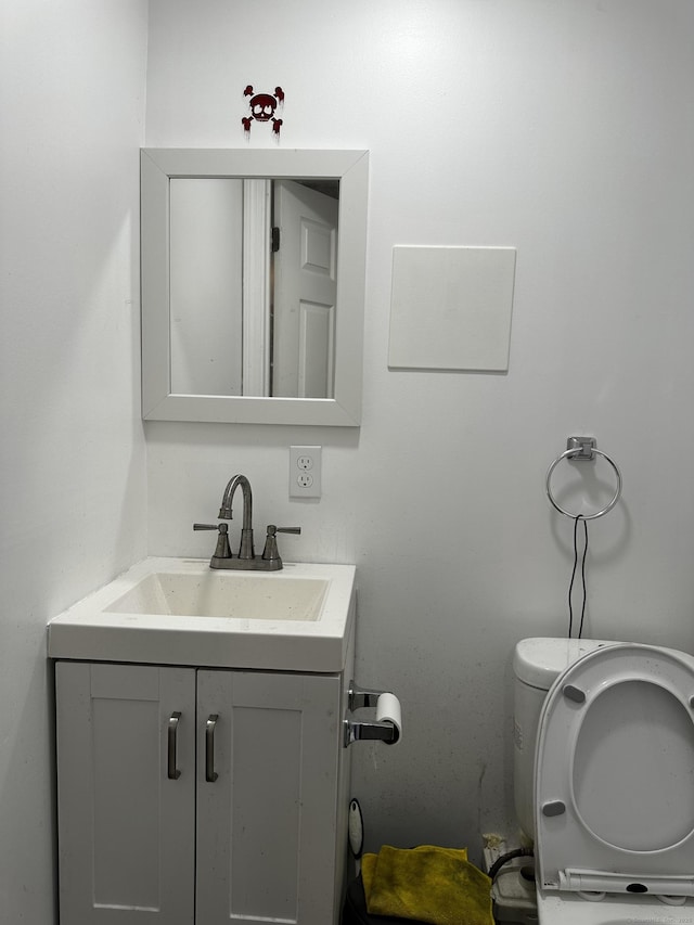 54 Carmel St, Hamden, CT 06518 - half bathroom featuring vanity and toilet