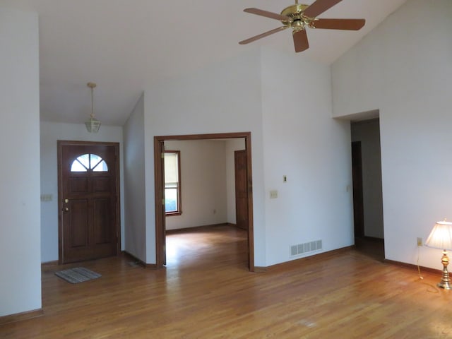 1200 Peck Ln, Cheshire, CT 06410 - foyer featuring high vaulted ceiling, light wood-type flooring, and a ceiling fan