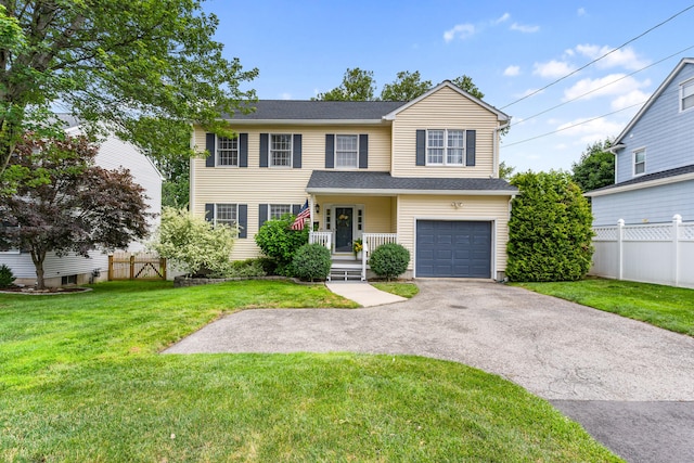 41 Arlington Rd, Stamford, CT 06902 - view of front of home featuring asphalt driveway and an attached garage
