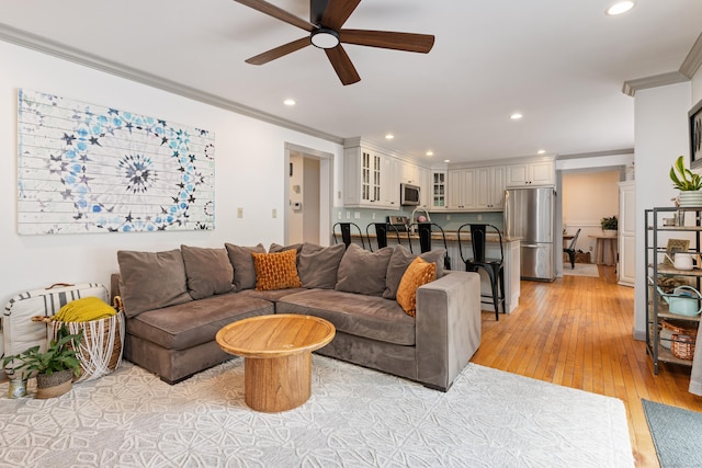 41 Arlington Rd, Stamford, CT 06902 - living room with ceiling fan, ornamental molding, recessed lighting, and light wood-style flooring