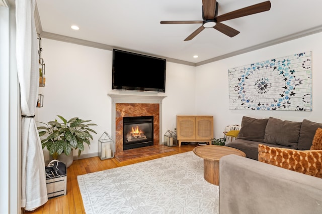 41 Arlington Rd, Stamford, CT 06902 - living room with ornamental molding, a ceiling fan, a fireplace, hardwood / wood-style flooring, and recessed lighting
