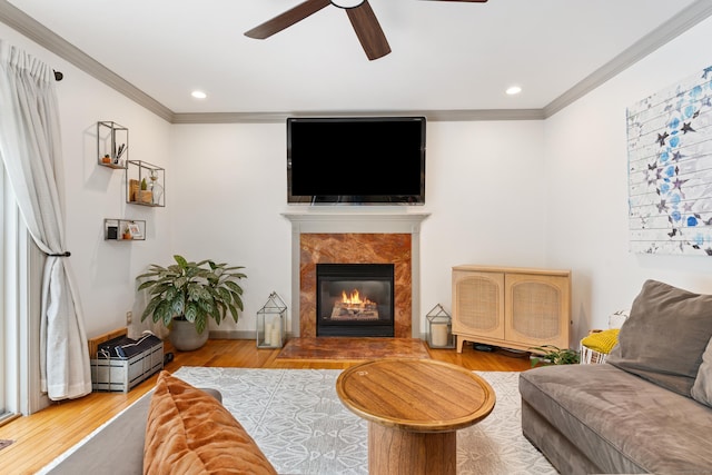 41 Arlington Rd, Stamford, CT 06902 - living area with ceiling fan, ornamental molding, wood finished floors, a premium fireplace, and recessed lighting