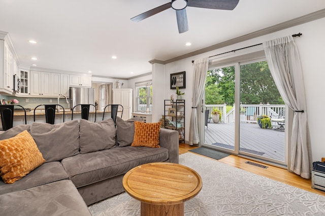 41 Arlington Rd, Stamford, CT 06902 - living area with crown molding, light wood-style flooring, a ceiling fan, and recessed lighting