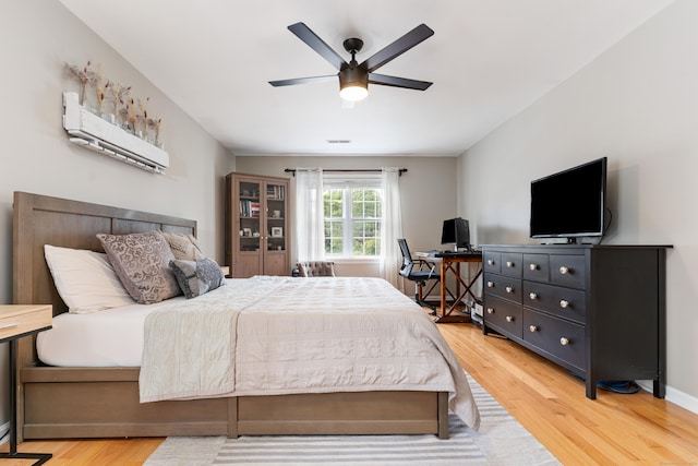 41 Arlington Rd, Stamford, CT 06902 - bedroom featuring light wood-style floors, ceiling fan, and an office area